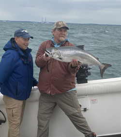 Two people fishing in NY