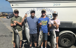 4 chinook salmon and bluefish caught by 4 people in Oswego