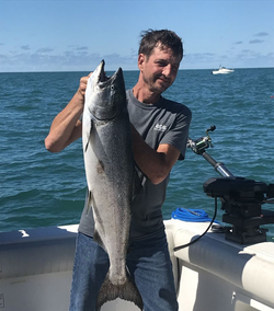 One person fishing in Oswego