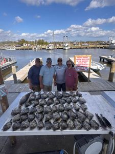4 people fishing in lafitte