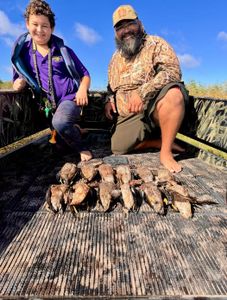 Two people fishing in the Lafitte area