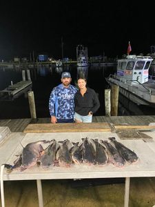 Two people fishing in Lafitte