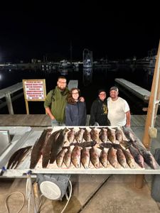 Four people fishing in Lafitte
