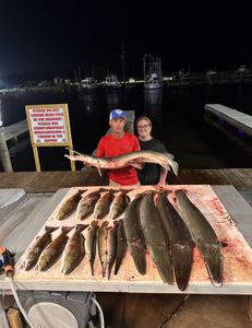 Two people fishing in Lafitte