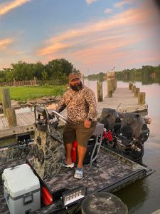 A person fishing in Lafitte