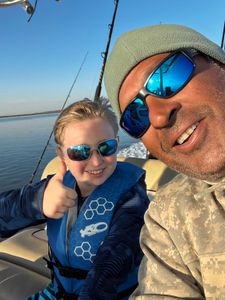 Two people enjoying a fishing tour at Midway