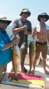 Friends fishing at Gulf Shores