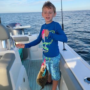  Little dude with a Flounder in Stone Harbor, NJ