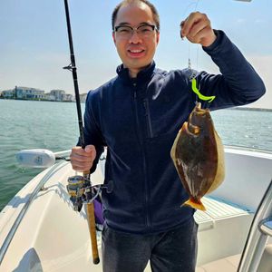 Hooked on flounder fishing, NJ.