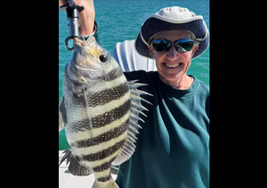 Rod-Bending Action and Fresh Filets with Fish Fins And Grins