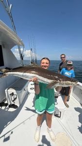 Family charter success with a 44" Cobia catch