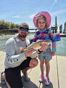 Dad and daughter fishing