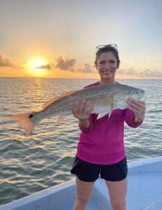 Galveston Bay drift fishing heavy redfish sunrise