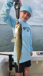 Young angler lands quality spotted seatrout