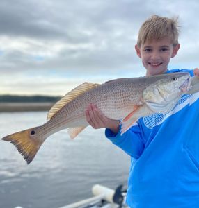 Kid Caught his Huge Redfish in North Carolina