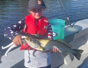 Kid Fishing for Speckled Trout in Cape Coral