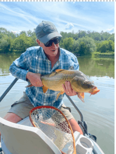 Conquering the Flats: Vinod's Exhilarating Carp Adventure with Seasoned Guide John