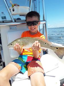Cape Canaveral, FL Kid Hooked a Redfish
