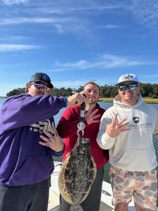 Windy day, strong flounder bite!