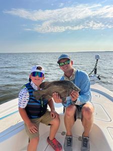 A productive day on the water brought redfish, trout, flounder, and tripletail, with one big fish getting away right at the boat.