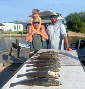 Family fishing day with steady trout action