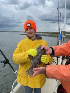 This guy was a natural! The flounder are hot!
