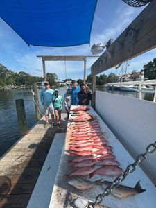 After weather cleared, military families enjoyed a productive trip with beeliners, mangrove snapper, and red snapper action.