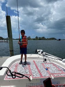 This kid in FL fishing is in love with fishing!