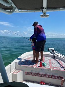 Kid taught how to fish in Florida!