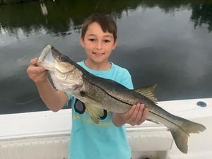 Kid caught big Snook in Jupiter, FL