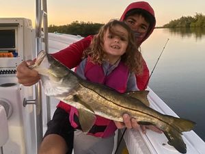 Family fishing for Snook in Jupiter, FL