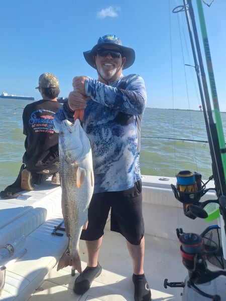 Tight lines and great weather for a perfect day fishing in Galveston Bay, Texas.
