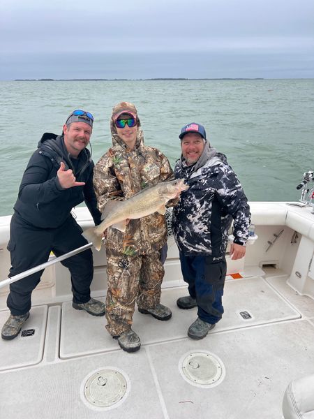 Team effort for a big walleye!