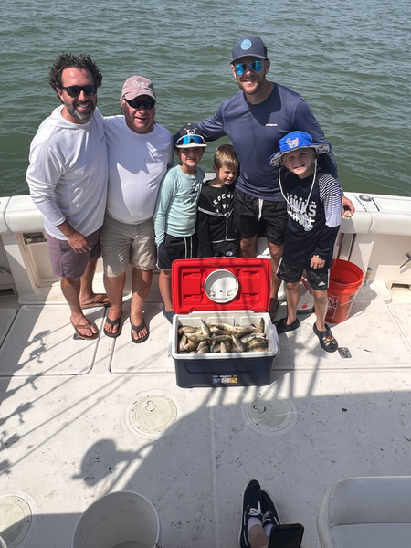 Cloudy skies can't dampen the spirits of these dedicated anglers!