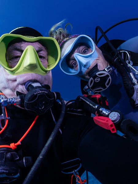 Snorkeling into calm, clear waters.