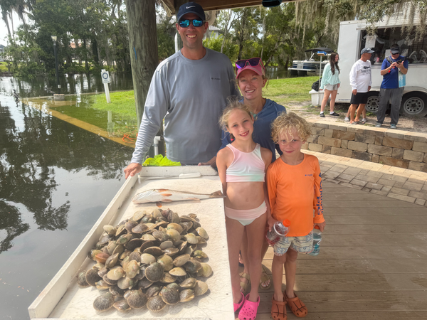 Crystal River redfish action with impressive scallop shell haul!