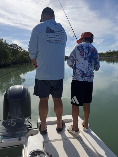 Peaceful fishing moments among Florida's scenic mangrove waters.