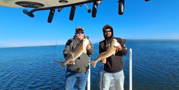 Safe, scenic, and full of action—Panama City inshore fishing is perfect for the whole crew.