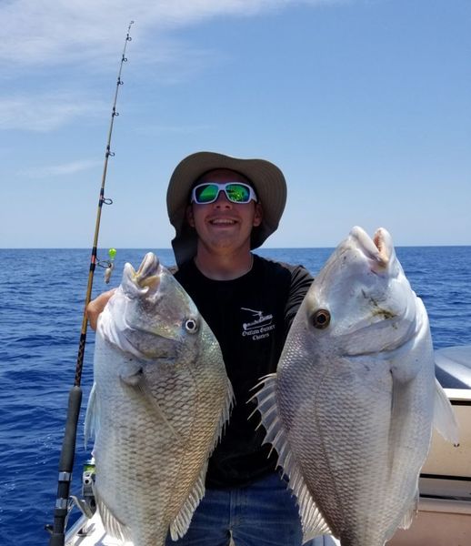 Hooked up offshore on a Clearwater deep sea fishing charter in the Gulf of Mexico.