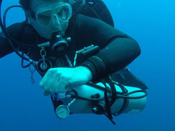 Exploring the depths with proper scuba gear.