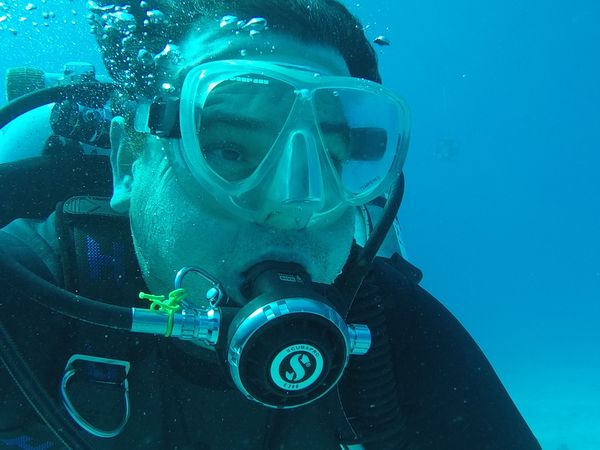 Exploring the underwater world through scuba diving adventure.