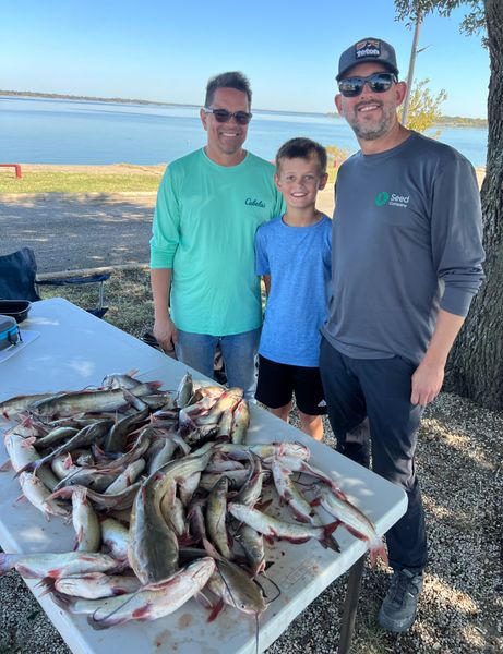 Landing a trophy fish on a Catfish guide Lake Lewisville trip