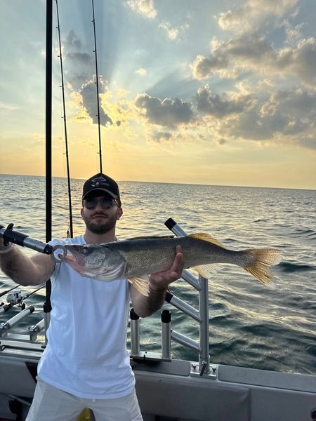 Fish chasing, laughter, and Erie sunsets.