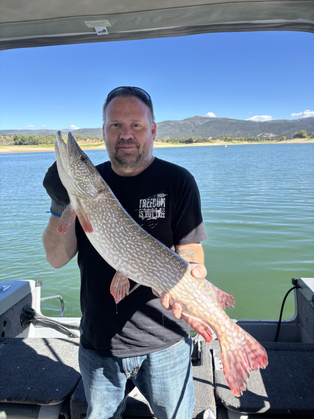 Nice Northern Pike caught using deep sea jigging in partly cloudy conditions!