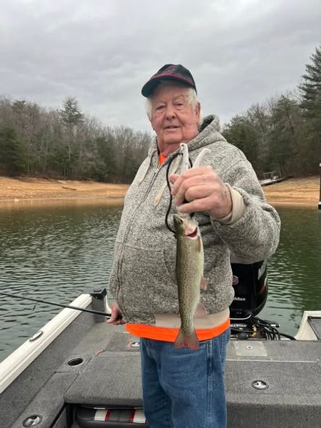 Lake Allatoona fishing in Georgia targeting striped bass and largemouth bass and some trout with great conditions and steady action.