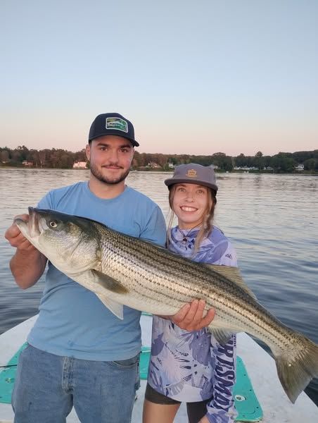 Reeling in big bass off Maine shores