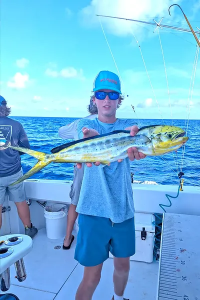 Young angler and a young Mahi-mahi - Islamorada, FL.