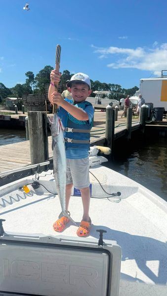 Proud young angler with a Spanish mackerel.