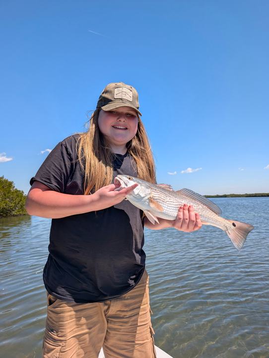 Peaceful day on the water with a fresh catch.