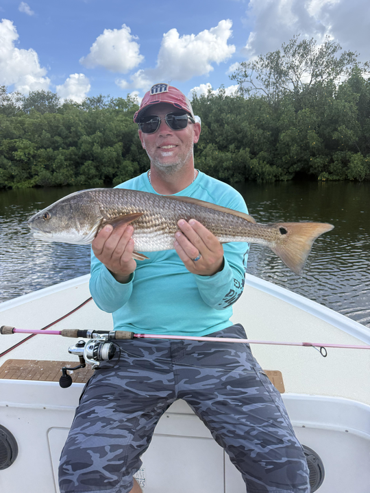 Reeling in the reds under partly cloudy skies in St. Pete!